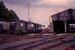 NW 4102 sits with an NS and Southern unit, beside the Engine House